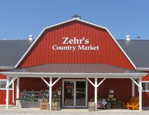 An outside shot of the Zehrs Coutry Market in Bayfield showing a barn-style building in red-brick colour